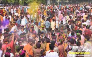 People playing with colours during Basanta Utsab at Shantiniketan