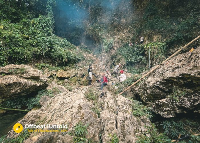 The villagers of Khaddum cleaning the area of the waterfall